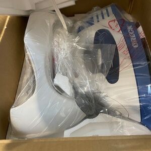 New in Box Oreck Cordless Steam Iron